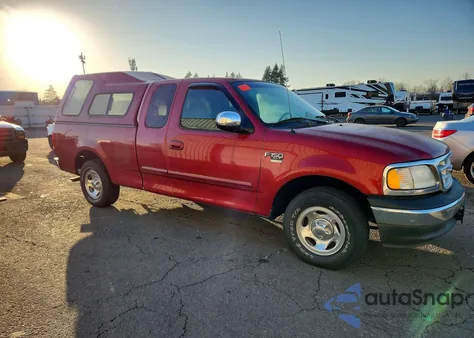 1999 Ford F150 z USA, uszkodzony, nr VIN 2FTRX17W0XCA70989